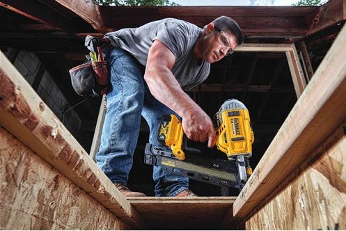 Man Using Dewalt Cordless Framing Nailer